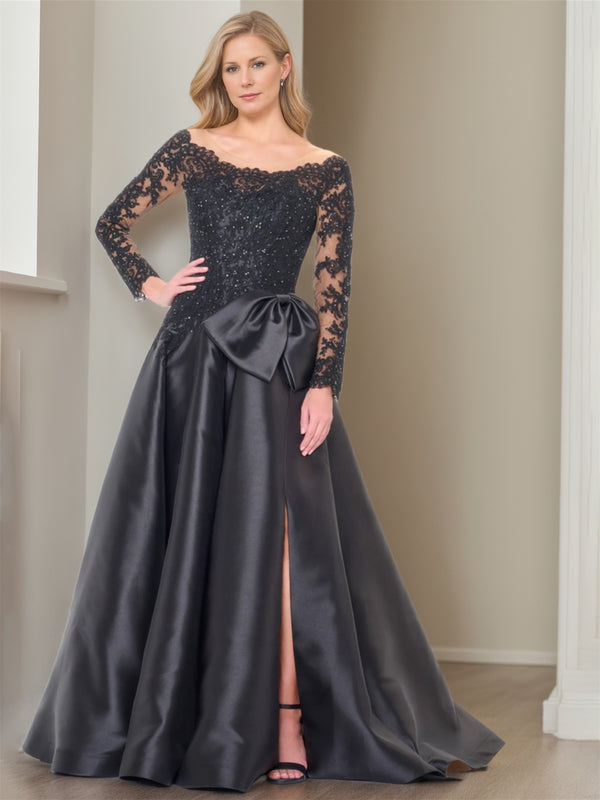 Tea-length black wedding dress with long lace sleeves