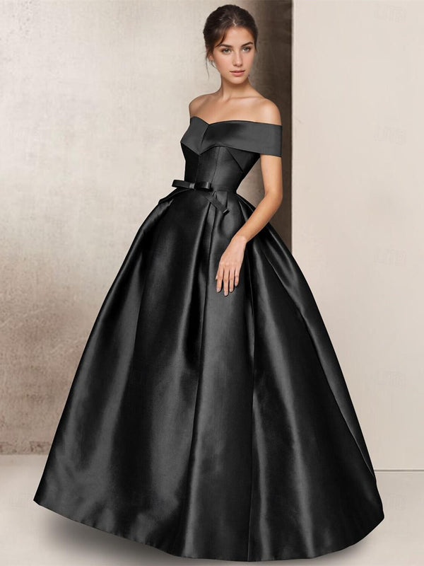 A-line black satin dress with short sleeves and bow detail