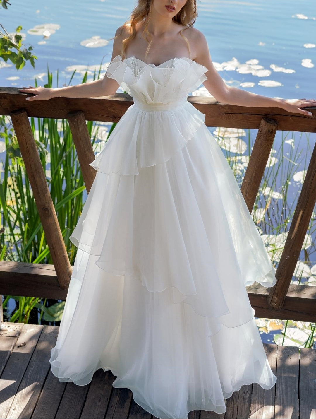 A-Line/Princess Strapless sleeveless Floor-Length Wedding Dress with Ruffles