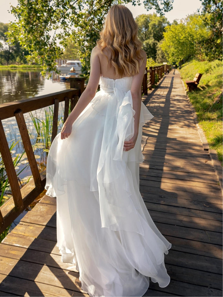 A-Line/Princess Strapless sleeveless Floor-Length Wedding Dress with Ruffles