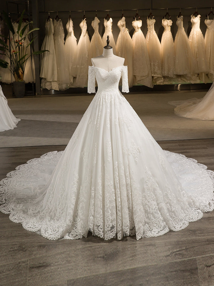 A-Line/Princess Tulle Off-the-Shoulder Half Sleeves Wedding Dresses with Lace Appliques