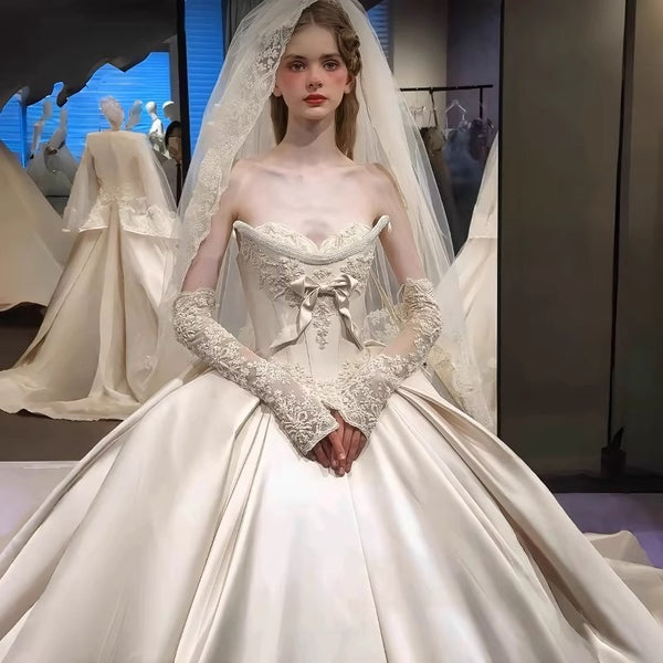 Ball Gown Off-The-Shoulder Floor-Length Pleated Wedding Dresses with Jewel Appliques & Bow
