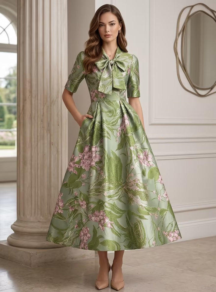 A-Line/Princess V-Neck Printed Satin Mother of the Bride Dresses with Bowknot Floral Tea-Length Half Sleeves