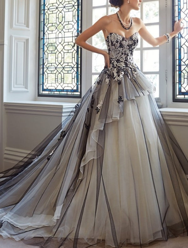 Black lace over white ball gown wedding dress with strapless neckline